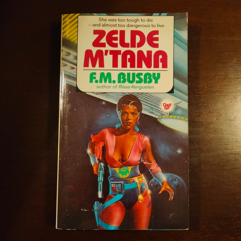 Zelde M'Tana - F. M. Busby